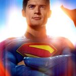 The 2025 Superman movie keyart with Superman looking out at the viewer and a flashy blue and red background that implies flying behind and around him