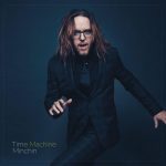 The album art for Tim Minchin's Album Time Machine. It features Tim Minchin in a dance style pose, and the words Tim Minchin, Time Machine